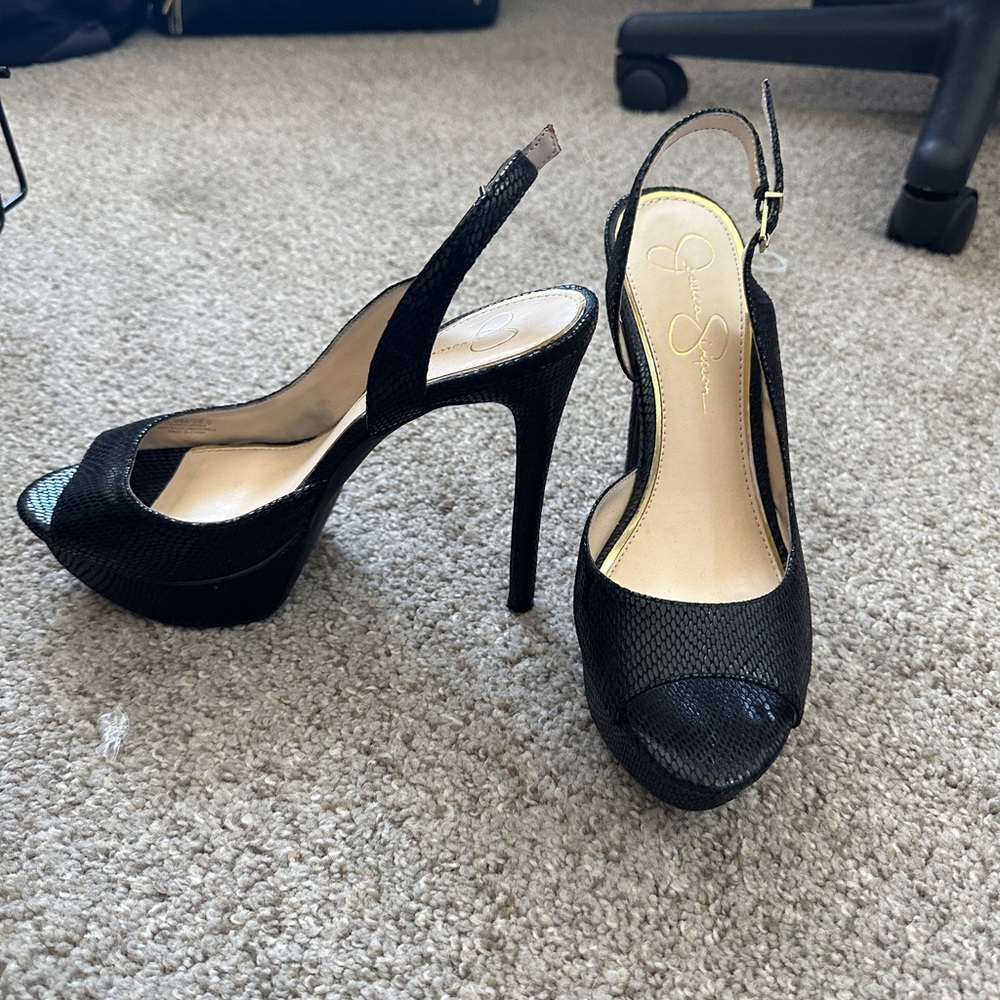 Black snakeskin peep-toe sling back pump. Jessica Simpson Size 8.5. Never worn.